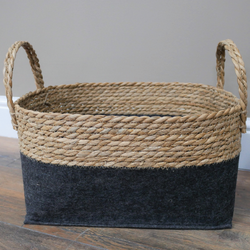 Stylish two-tone woven planter basket for indoor plants, lightweight at 1.92kg.