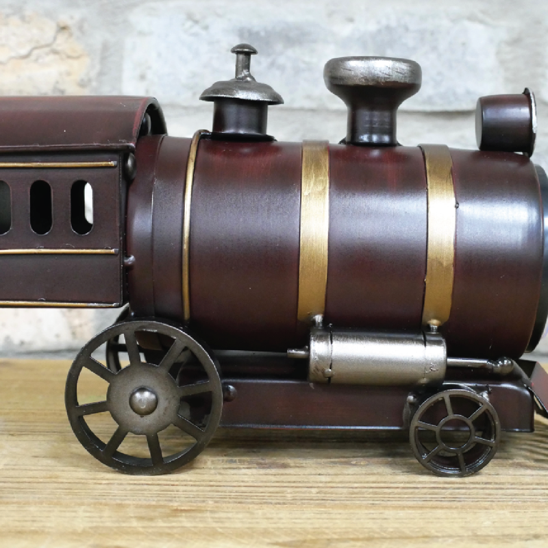 Playful steam train snow plough design clock, perfect for railway enthusiasts, 17cm H x 26cm W x 11cm D, 0.8kg.