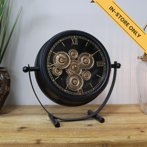 Clock with cogs desktop black body gold accents. This clock has moving cog parts (requires 3X AA batteries, not included. 1 for timekeeping, 2 for moving cogs), 28cm high, 30cm wide, 11cm deep, weighs 1.22kgs.