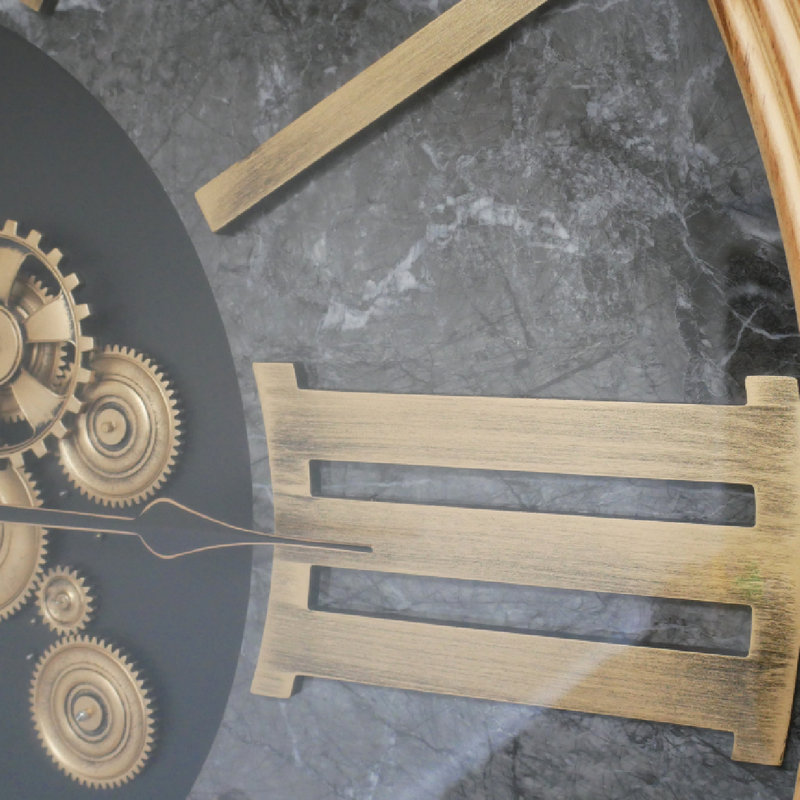 Oversized cog clock featuring functional rotating gears, dimensions 112cm H × 112cm W × 9cm D, weight 26kg; powered by 3 AA batteries (1 for time, 2 for cogs).