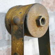 Rustic-modern wall clock with mechanical drive belt accents, 43cm H x 19cm W x 9cm D, total weight 0.8kg.