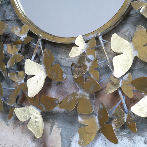 Decorative circular mirror featuring butterfly motifs, dimensions 53cm H × 53cm W × 4cm D, weight 1.16kg.