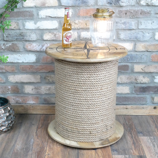 Decorative drum-style side table featuring nautical rope detailing and a compass design, dimensions 55cm H × 49cm W × 49cm D, weight 11.2kg.