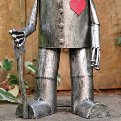 Whimsical tin man sculpture in medium size, dimensions 41cm H × 20cm W × 15cm D, weight 1kg.