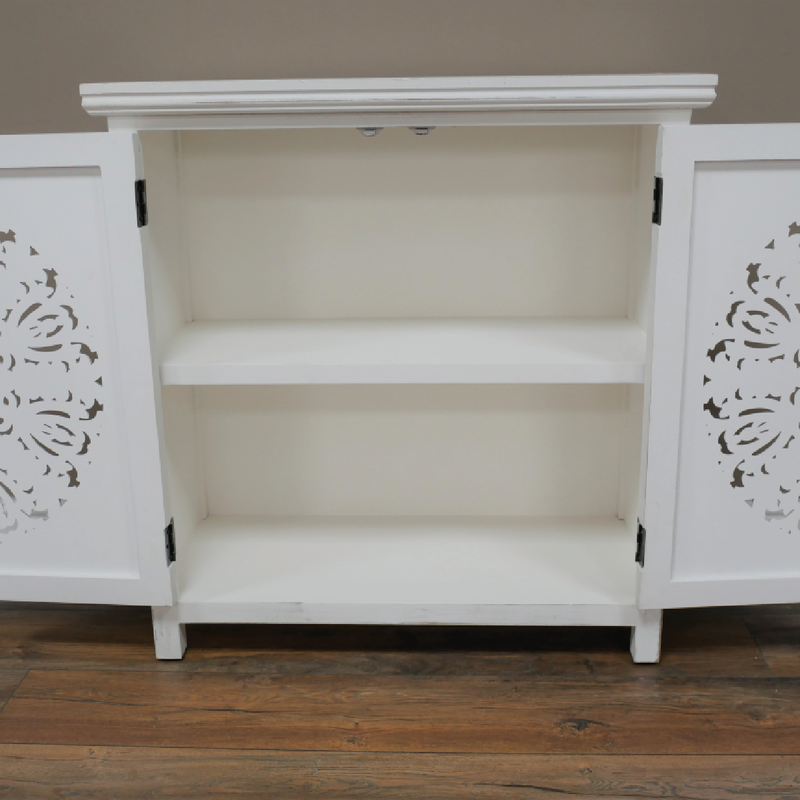 Stylish white and gold two-door storage cabinet with intricate carved detailing, 84cm high by 80cm wide by 36cm deep, 14.5kg.