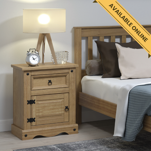 Bedside cabinet with one drawer and one cupboard door in warm natural pine finish, 68.5cm high, 53cm wide, 38cm deep, weighing 13kg.