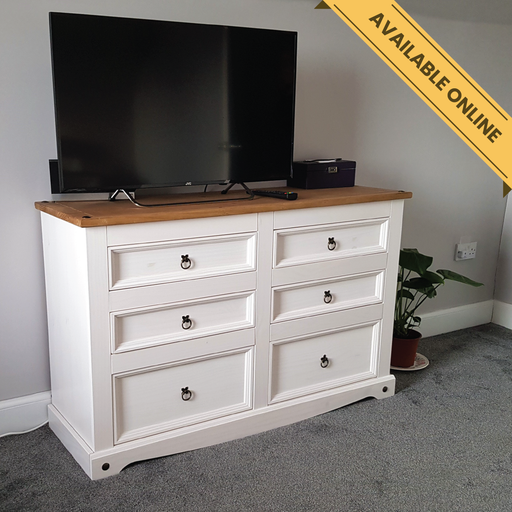 Wide six-drawer chest featuring three smaller top drawers and three larger bottom drawers, offering ample storage with classic craftsmanship; height 83.4cm, width 132.1cm, depth 43cm; weight 37.5kg.