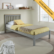Simple single bedstead with a low footboard, natural wooden slats, and a robust frame; height 100cm, width 101.6cm, depth 201.5cm; weight 22.5kg.