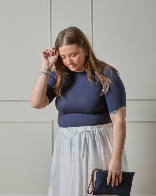Chalk women’s Maddie top navy cotton short sleeve layered over dress close-up detail