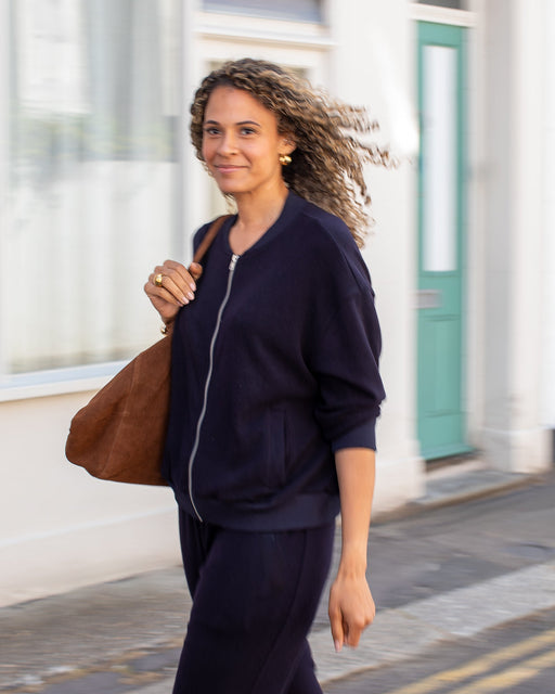 Chalk women’s Orla zip-up top midnight navy close-up side angle