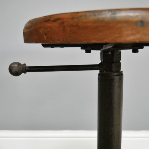 Sturdy industrial-style bar stool featuring a natural wood seat and metal frame, dimensions 59cm H × 35cm W, weight 10.5kg.