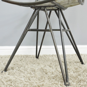 Sleek industrial-style chair made of welded wire metal, dimensions 86cm H × 39cm W × 51cm D, weight 4.75kg.