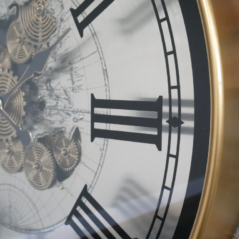 Industrial-style white clock with exposed moving cogs and black Roman numerals, 80cm in diameter and 10cm deep, 10.8kg in weight; operates on 3 AA batteries (not included).