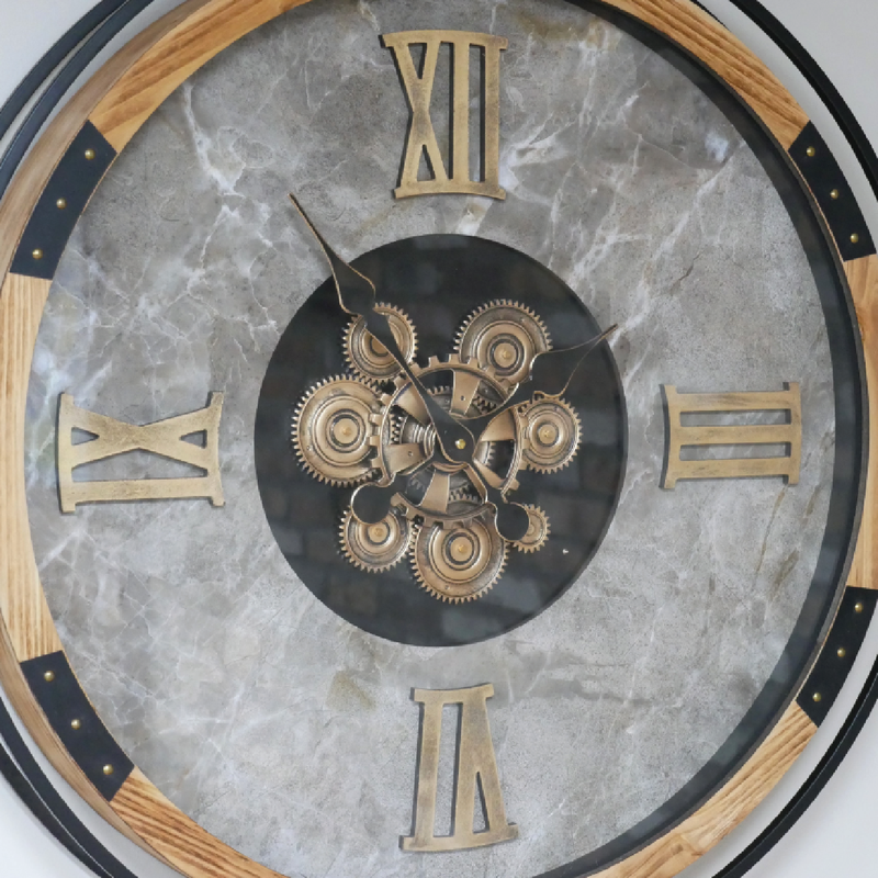 Industrial-luxury wall clock with a wood and metal frame, marble back panel, and mechanical cog detailing, 87 × 74 × 9cm, total weight 9kg.