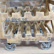 Contemporary wine trolley with an industrial aesthetic, featuring metal accents and wood surfaces, 88cm H x 59cm W x 41cm D, 28kg.