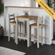 Compact high breakfast bar set featuring a live-edge rectangular table and two matching stools, blending rustic warmth with contemporary style; table dimensions: height 100cm, width 60cm, depth 80cm; total weight 28kg.