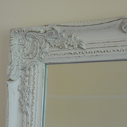 Elegant narrow white wall mirror, 130cm tall by 40cm wide, 6kg in weight, perfect for hallways or living spaces.