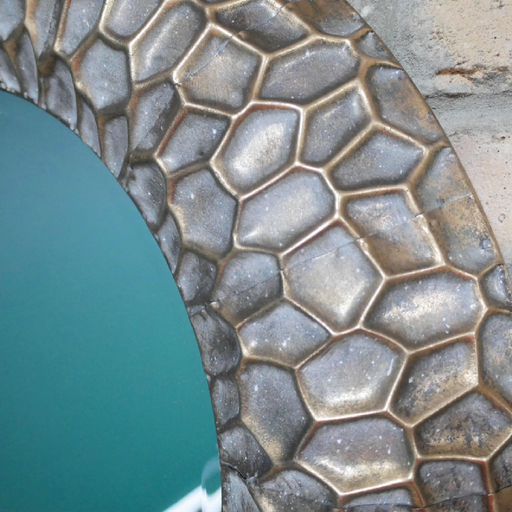Stylish round decorative mirror with a metallic border, 72cm wide by 72cm high by 5cm deep, 3.34kg in weight.