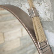 Decorative circular mirror in rose gold finish featuring a leather or fabric hanging strap, dimensions 47cm H × 47cm W × 4cm D, weight 2kg.
