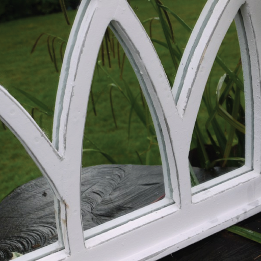 Elegant white mirror with a soft arched top, dimensions 62cm H × 55cm W × 4cm D, weight 3.75kg.