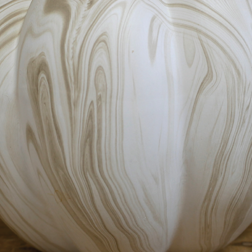 Stylish oversized pumpkin with a swirling textured surface, dimensions 26cm H × 27cm W × 27cm D, weight 2.0kg.