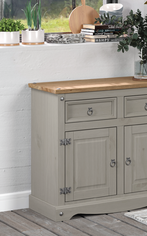 Compact solid pine sideboard with two drawers and two doors, offering smart storage for smaller spaces; height 80.6cm, width 91cm, depth 43cm; weight 24.5kg.