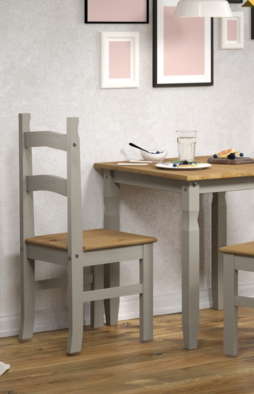 Compact square dining set with a solid wood table and two matching chairs, ideal for small or cosy eating areas; table dimensions: 75cm H × 75cm W × 75cm D; total set weight 24.5kg.