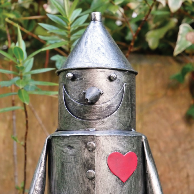 Rustic-style decorative figure of a tin man, 41cm tall with a 20cm by 15cm base, total weight 1kg.