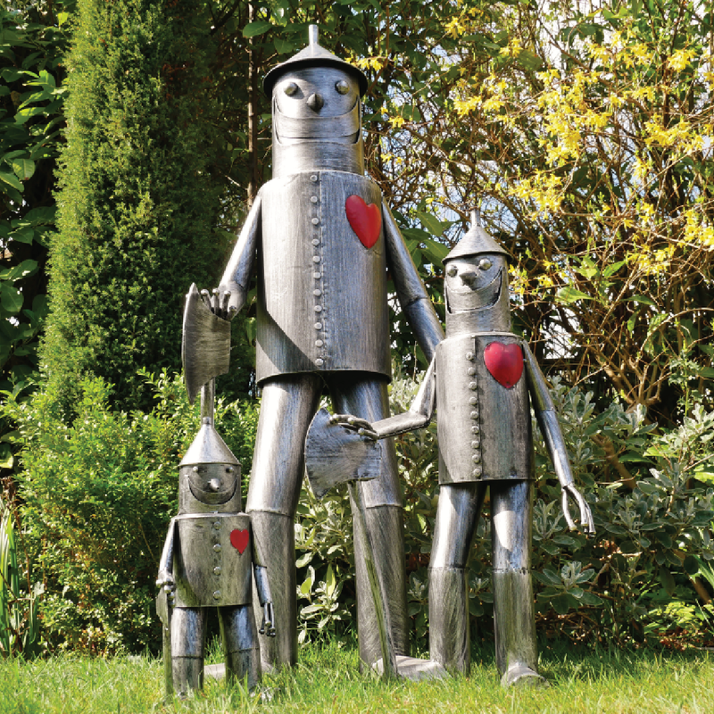 Decorative metal tin man statuette with articulated detailing, 41cm H x 20cm W x 15cm D, weighing 1kg.