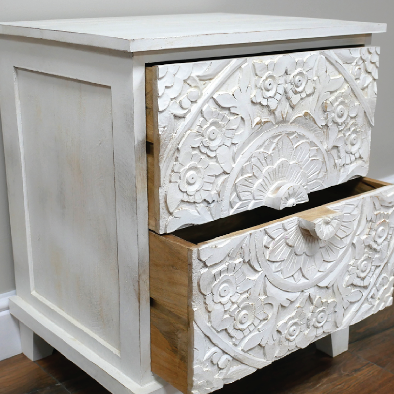 Rustic-modern white bedside cabinet with detailed carving and two closed drawers, 61 × 51 × 42cm, total weight 15.44kg.